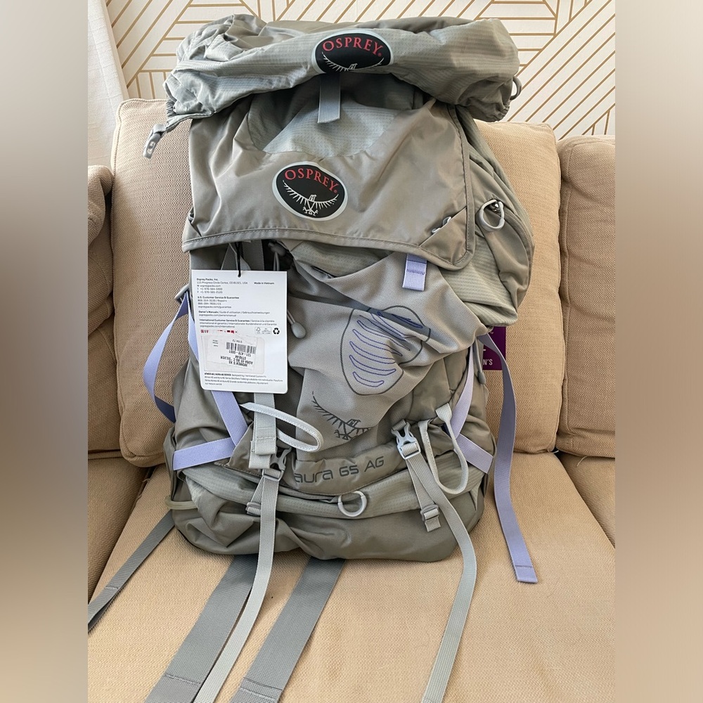 Brand new Women’s Osprey XS backpacking Aura 65 AG, light gray and purple